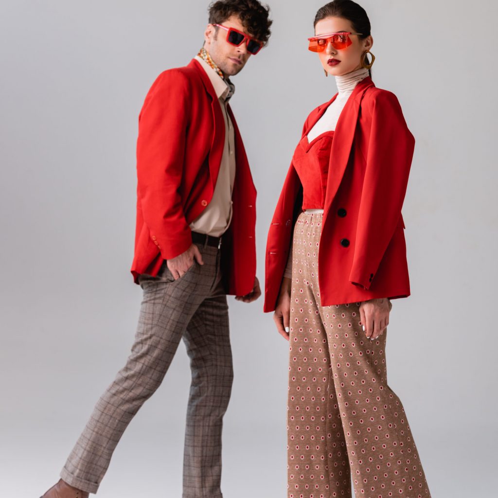 Full,Length,View,Of,Fashionable,Couple,In,Red,Blazers,And